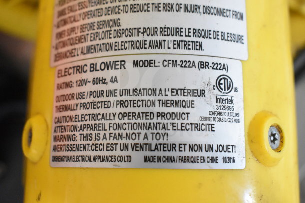 Label on CFM-222A electric blower shows specs: 120V, 60Hz, 4A. For outdoor use, thermally protected, warning included.
