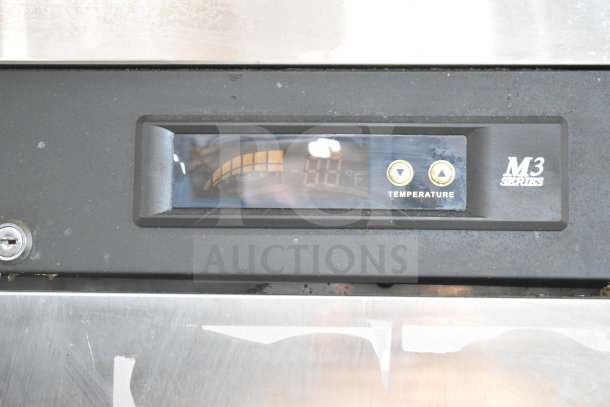 Turbo Air M3F19-1 commercial freezer control panel with temperature display.