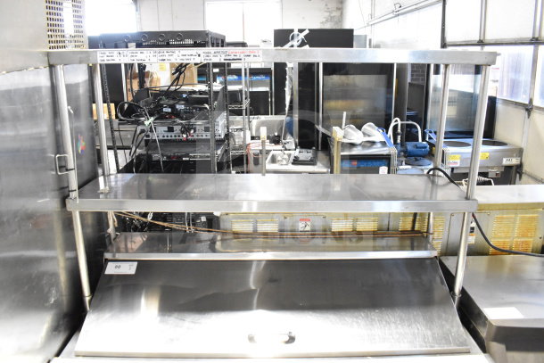 Turbo Air MST-48-N commercial sandwich salad prep table with 2-tier overshelf, bain marie top, on casters, 115V, 1 phase.
