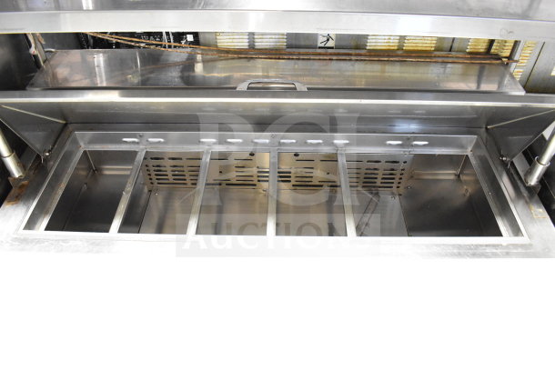 Turbo Air MST-48-N prep table with bain marie top, 2-tier shelf, stainless steel, commercial casters, 115V, 1-phase.