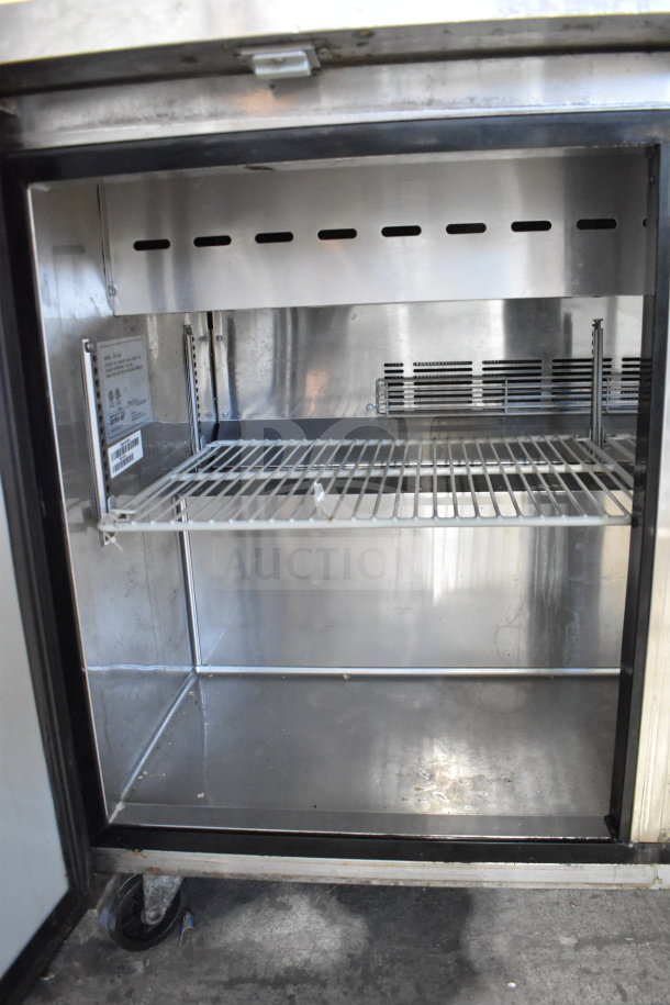 Turbo Air MST-48-N commercial sandwich prep table inside view, stainless steel, clean condition, on commercial casters.