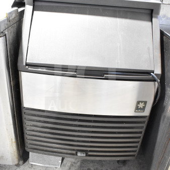 Manitowoc QD0212A commercial undercounter ice machine, 115V, self-contained, black and silver, visible logo, good condition.