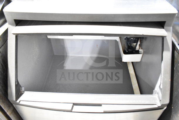 Manitowoc QD0212A undercounter ice machine, commercial, self-contained, 115V, 1 phase, empty ice bin, clean condition.