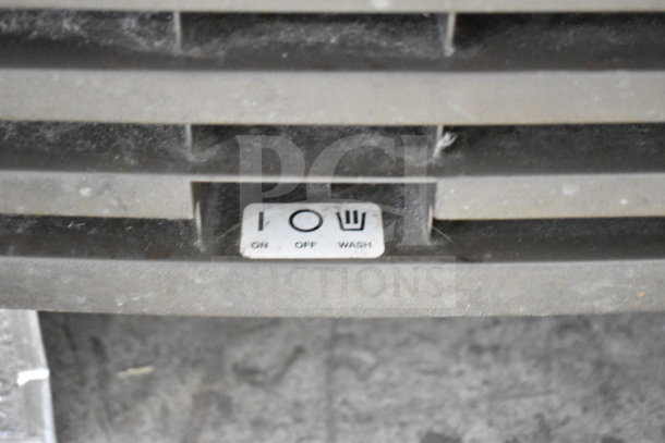 Manitowoc QD0212A Ice Machine control panel; ON/OFF/WASH settings visible, 115 volts, indicative of use condition.