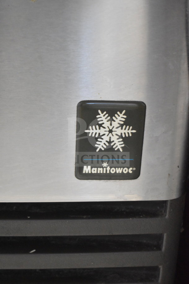 Manitowoc QD0212A ice machine, stainless steel, undercounter model, 115V, commercial use, visible logo and details.