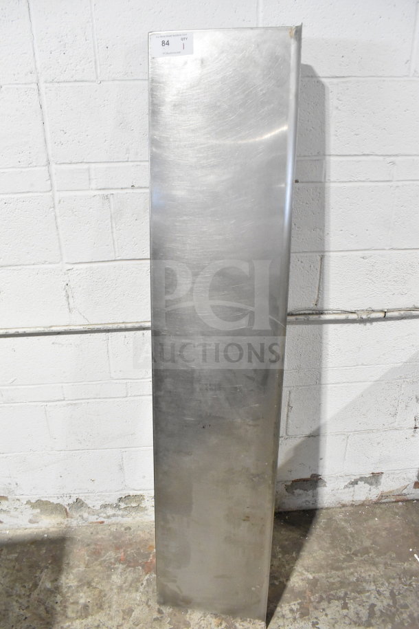 Metal wall mount shelf, rectangular, polished finish, slight wear. Auction label with quantity 1 visible on top corner.