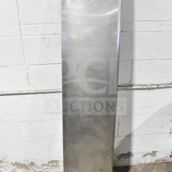 Metal wall mount shelf, rectangular, polished finish, slight wear. Auction label with quantity 1 visible on top corner.