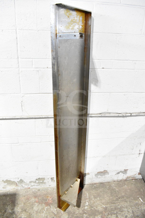 Wall mount shelf made of metal, showing signs of rust. Long, narrow design suitable for industrial use.