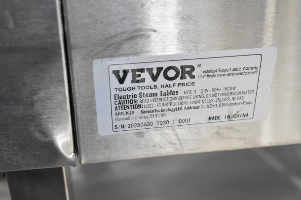 Vevor MDC-3 Electric 3 Bay Steam Table label, 120V, 1 phase, 1500W. Caution instructions and manufacturer details visible.