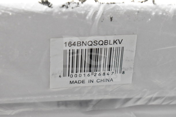 Barcoded label showing model 164BNQSQBLKV, "Made in China," for new Lancaster banquet chairs.
