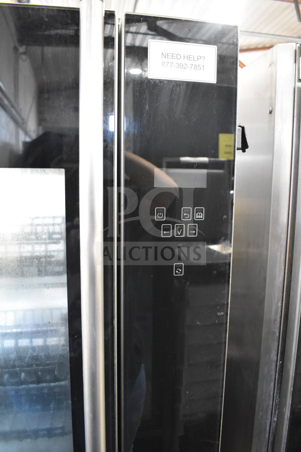 Fri-jado TDR 7-P electric rotisserie oven, 208V, 3-phase, commercial floor model, on casters, control panel visible.