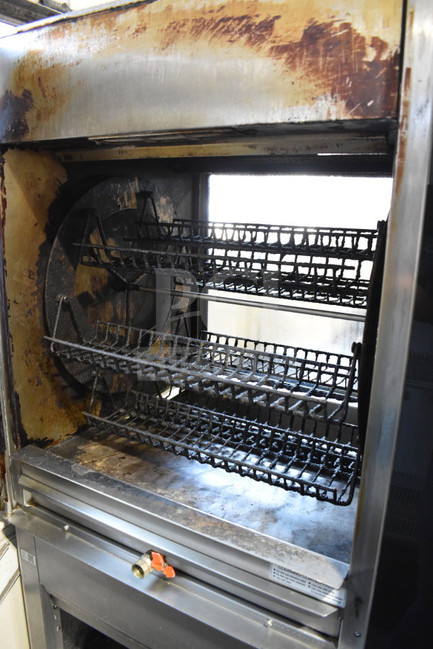 Fri-jado TDR 7-P commercial electric rotisserie oven on casters, 208V, 3 phase. Interior shows signs of wear.