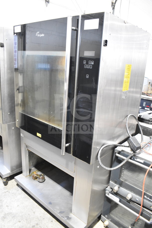 Fri-jado TDR 7-P commercial electric rotisserie oven on casters, 208V, 3 phase. Stainless steel, touch controls, used condition.