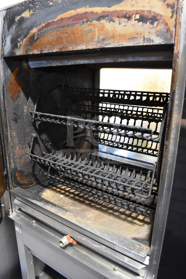 Fri-jado TDR 7-P commercial rotisserie oven with casters, 208V, 3 phase, worn interior, visible heating racks, used condition.
