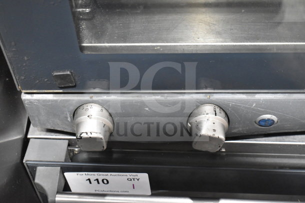 2023 Cadco Unox XAF003-US Roberta convection oven, electric, 120V, metal, commercial countertop model, control dials visible.