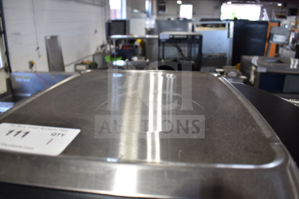 2025 Hobart HTi-7LH4W commercial food portioning scale, missing power cord, stainless steel top, auction label visible.