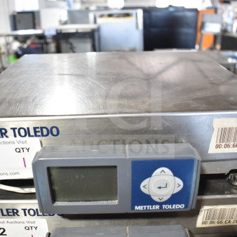 Mettler Toledo BC Commercial Food Portioning Scale, stainless steel, digital display, barcode tags visible, good condition.
