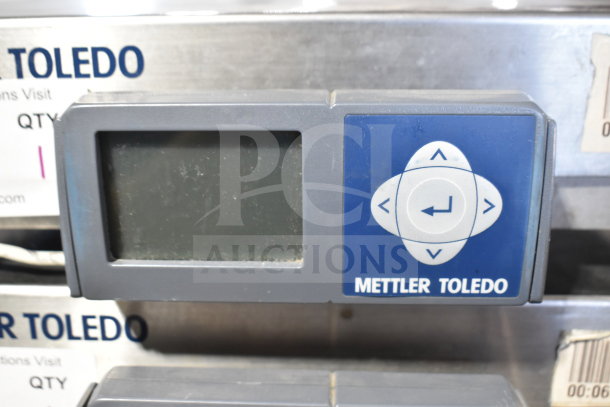 Mettler Toledo BC commercial countertop food portioning scale, digital display, control buttons, gently used condition.