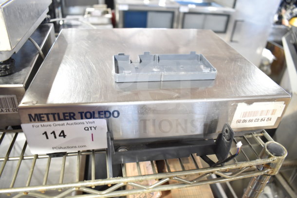 Mettler Toledo BC Commercial Countertop Food Portioning Scale in used condition, showing metal surface and barcode tag.