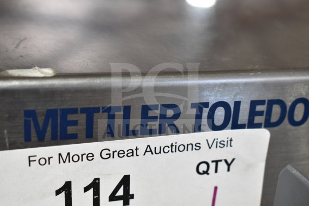 Mettler Toledo BC commercial countertop food portioning scale, visible brand logo, auction label attached.