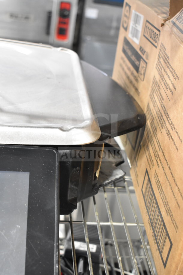 Hobart Commercial Countertop Food Portioning Scale, 120/208-240V, 1 Phase, shown partially on a metal shelf.