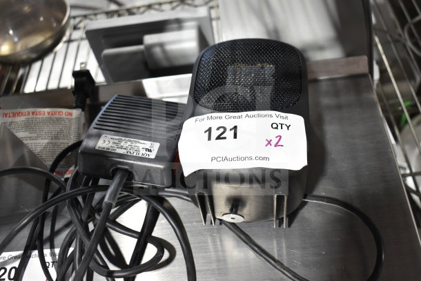 Mainstays MH-16B ceramic heater and Aquiline pedal, auction label "121 QTY x2". Cords visible, gently used condition.