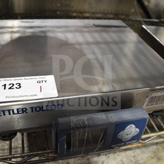Mettler Toledo BC Commercial Countertop Food Portioning Scale, stainless steel, visible barcode, digital display, good condition.