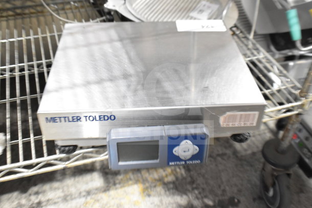 Mettler Toledo BC Commercial Food Portioning Scale, stainless steel, digital display, excellent condition, barcode visible.