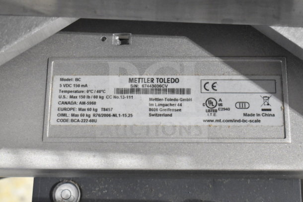 Mettler Toledo BC Commercial Scale, model BC, label showing specifications: 5 VDC, max 150 lb/60 kg, made in China.