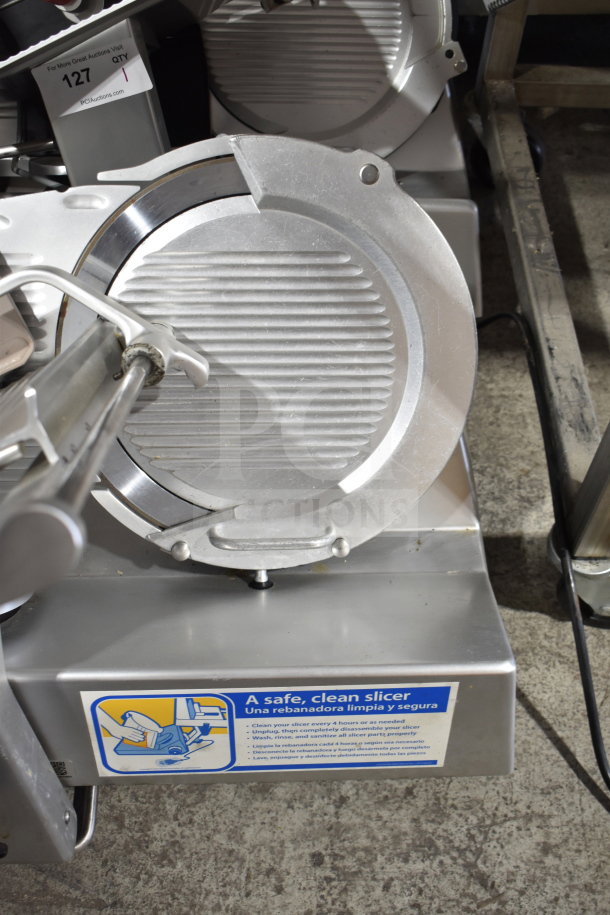 Bizerba SE 12 D US commercial meat slicer, 120V, 1-phase, clean condition, safety instructions label visible.