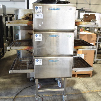 Three Turbochef HhC2020 electric conveyor ovens with stands, commercial casters, 208/240V, 3-phase, labeled asset IDs.