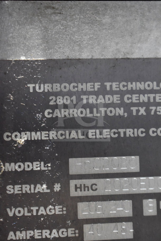 Close-up of Turbochef HhC2020 label, showing model info, serial number, voltage (208-240V), and amperage (40-48A).