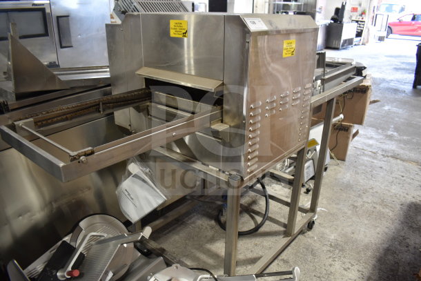 Belshaw TG50 Thermoglazing Station on casters, stainless steel, 208V, 1 phase, good condition, caution labels visible.
