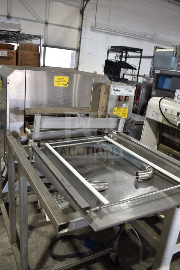 Belshaw TG50 Thermoglazing Station, commercial floor model on casters, stainless steel, 208V, 1 phase, visible safety labels.