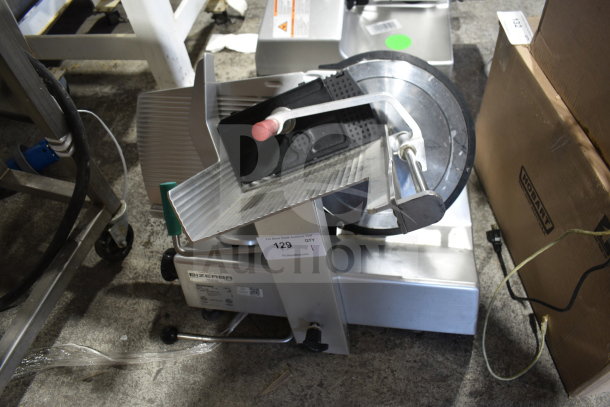 2019 Bizerba GSP H commercial meat slicer, 120 volts, 1 phase, silver, includes original labels and safety guard.