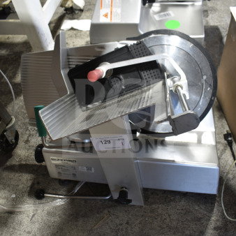 2019 Bizerba GSP H commercial meat slicer, 120 volts, 1 phase, silver, includes original labels and safety guard.