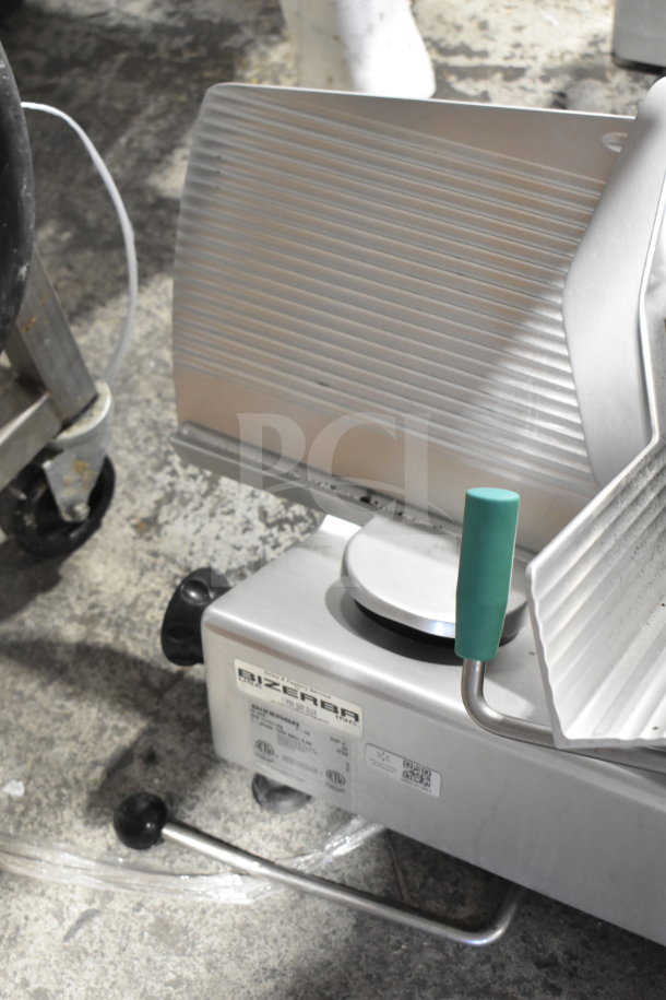 2019 Bizerba GSP H Commercial Meat Slicer, 120V, 1 Phase. Silver finish, green handle, model and safety labels visible.