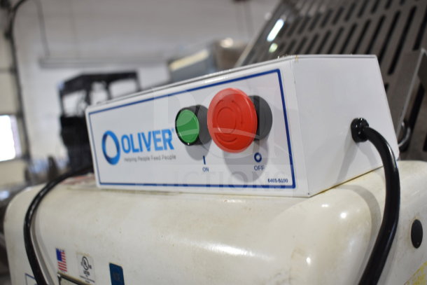Oliver 797-32NC bread slicer control panel with green and red buttons, logo, and Pro Guard safety chute. 115V, 1 Phase.