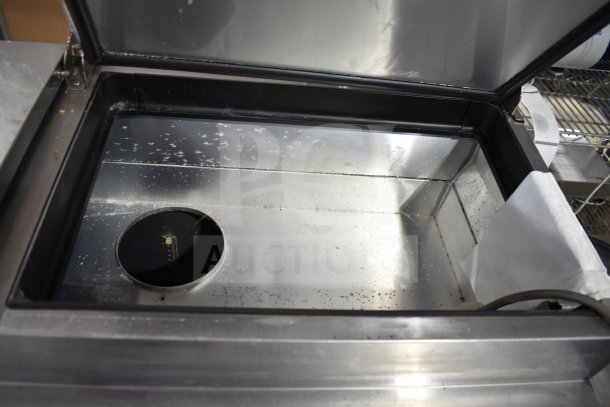 True TPP-67 Commercial Pizza Prep Table in stainless steel, open lid showing interior space, 115 volts, 1 phase, used condition.