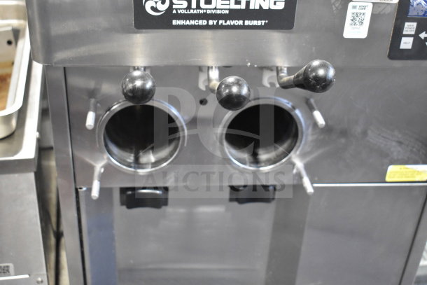 Stoelting F131-38I2 countertop soft serve machine, 2 flavors with twist option, stainless steel, visible control panel and levers.