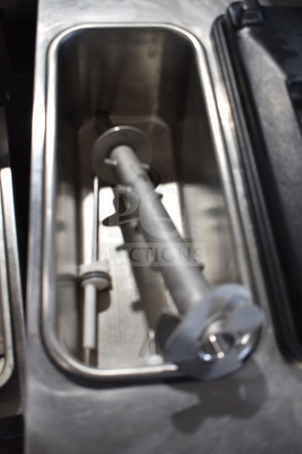Stoelting F131-38I2 soft serve ice cream machine interior view, showing auger and chamber. Stainless steel finish.