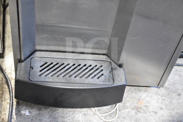 Stoelting F131-38I2 countertop ice cream machine, 2-flavor with twist, shown with foot pedal, stainless steel exterior.