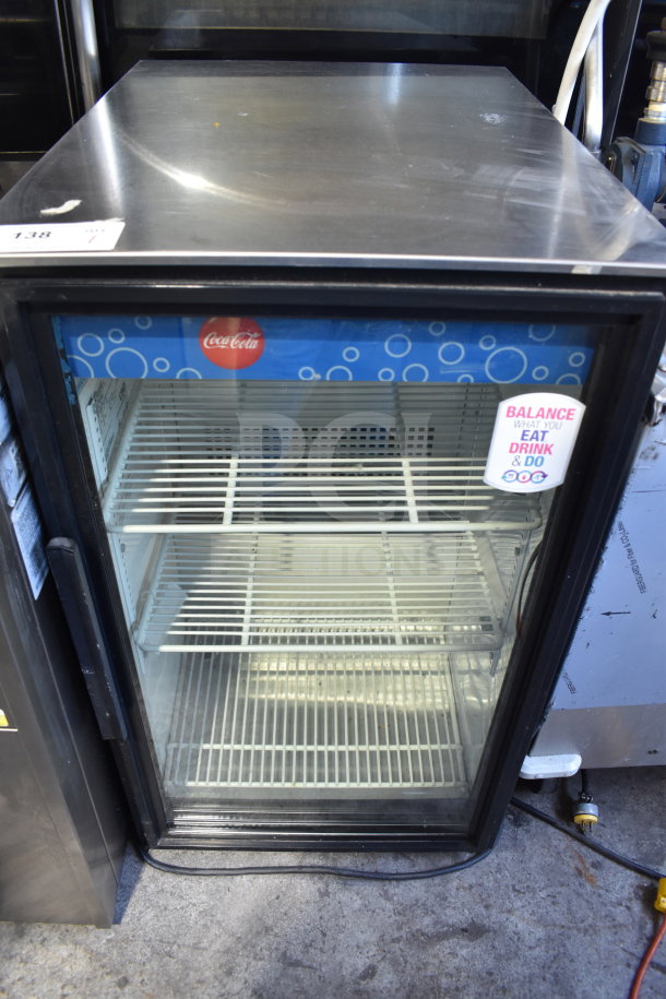 True GDM-06-LD mini cooler merchandiser, 115V, 1 phase, with glass door, Coca-Cola branding, shelves, in good condition.
