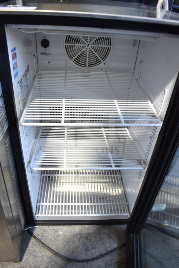 True GDM-06-LD mini cooler merchandiser, 115 volts, 1 phase. Features adjustable shelves, fan vent, and temperature control knob.