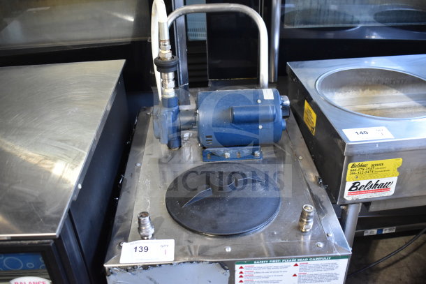 Frontline 402 Commercial Oil Caddy with commercial casters. Features include a 120-volt motor and visible safety labels. 