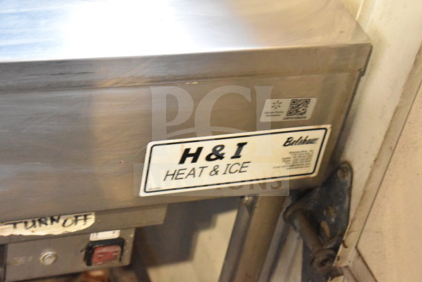 Belshaw H&I-2 Icing Station, stainless steel, two wells, commercial casters, 208/240V, Phase 1, label reads "H&I Heat & Ice."