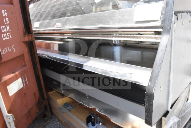 Commercial floor style warming display case merchandiser, stainless steel, spacious interior, good condition.