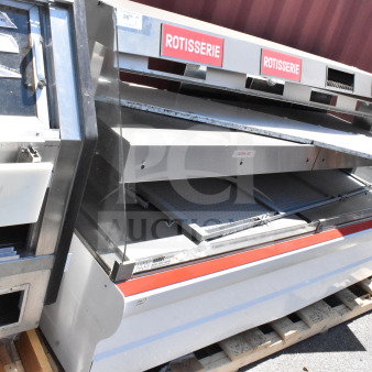 Commercial 2-tier warming display case merchandiser, stainless steel, labeled "Rotisserie," used condition, on pallet.