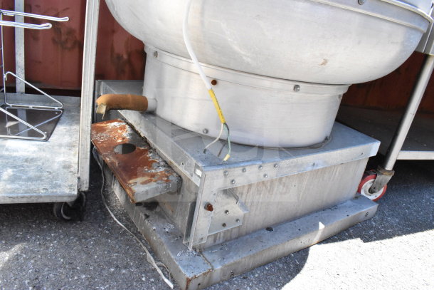 CaptiveAire NCA18FA rooftop mushroom exhaust fan, 115V, 1 phase, visible wear and rust, industrial setting.