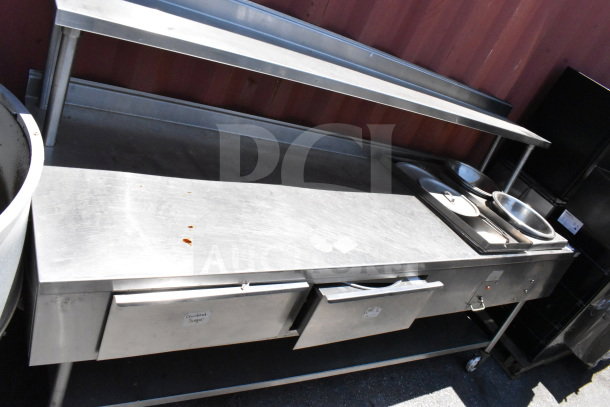 Commercial table with two drawers, over shelf, under shelf, heated well, stainless steel, good condition.